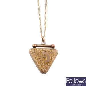 An early 20th century locket with 9ct gold chain.