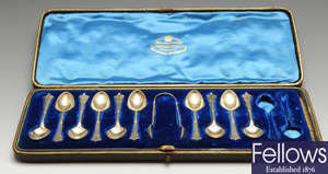A selection of flatware to include a late Victorian part set of ten silver coffee spoons and a pair of sugar tongs, etc.