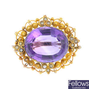 A late Victorian gold amethyst and split pearl brooch.