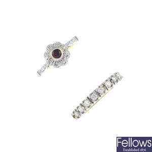 A garnet and diamond cluster ring, and a diamond half eternity ring.