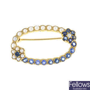 A 9ct gold sapphire and split pearl brooch.