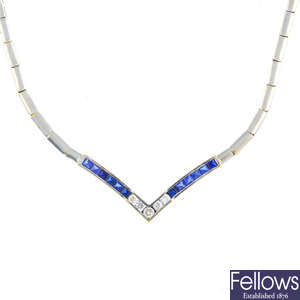 A diamond and sapphire necklace.