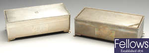 Two silver mounted table cigarette boxes.