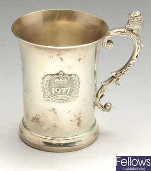 A modern silver mug commemorating The Queen's Silver Jubilee.