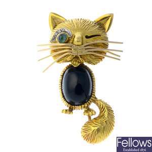 KUTCHINSKY - a 1960s 18ct gold gem-set cat brooch.