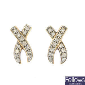 A pair of 9ct gold diamond earrings.