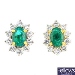 A pair of 18ct gold emerald and diamond cluster earrings.