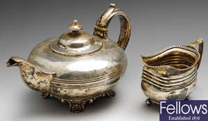 A William IV silver teapot and a cream jug.