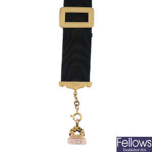 A late Victorian 9ct gold fob, with 9ct gold moire Albertina.