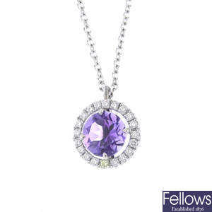 A diamond and amethyst cluster pendant, with a chain.