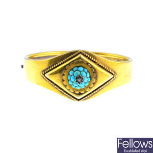 A late Victorian 15ct gold turquoise and diamond bangle.