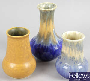Four Ruskin pottery vases, together with three Ruskin pottery eggcups and a similar dish stand.