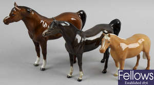 A collection of Beswick horses and other animal ornaments, etc.