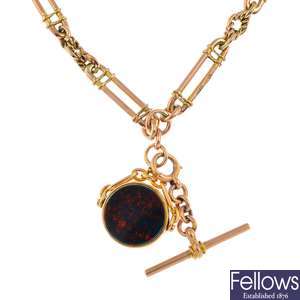 An early 20th century 9ct gold Albert, with a late Victorian 9ct gold bloodstone and carnelian swivel fob.