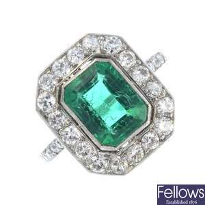 An Art Deco platinum, diamond and green paste dress ring.