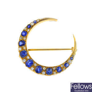 A late Victorian gold sapphire and diamond crescent brooch.