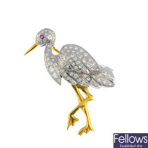 An 18ct gold diamond heron brooch.