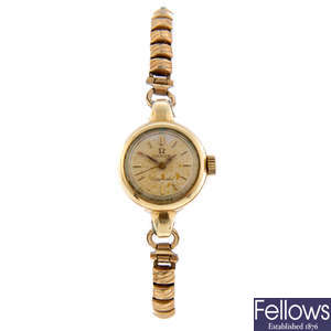 OMEGA - a lady's gold plated Seamaster Ladymatic bracelet watch.