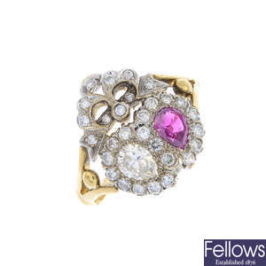 A late Victorian gold ruby and diamond lover's hearts ring.