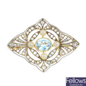 An Edwardian diamond, aquamarine and split pearl brooch.
