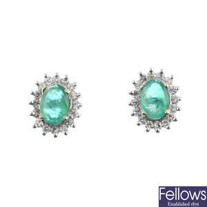 A pair of emerald and diamond cluster earrings. 