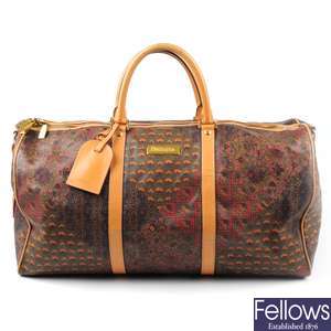 ESCADA - a vintage coated canvas duffel bag.