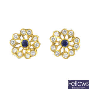 A pair of 18ct gold sapphire and diamond floral earrings.
