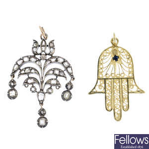 Two diamond and gem-set pendants.