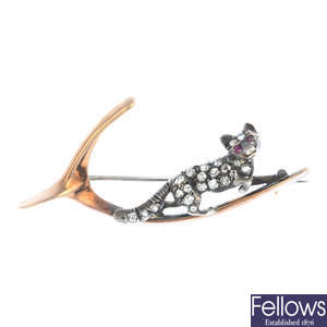 A late Victorian gold and silver, ruby and diamond fox brooch.