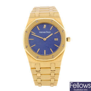 AUDEMARS PIGUET - a mid-size 18ct yellow gold Royal Oak bracelet watch.