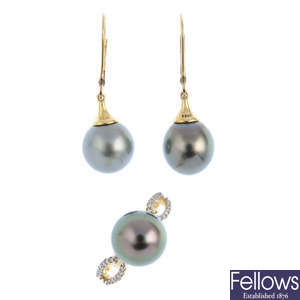A 9ct gold cultured pearl and diamond ring and a pair of cultured pearl earrings.