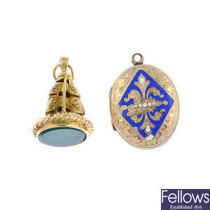 A late Victorian gold enamel locket pendant and a chrysoprase fob.