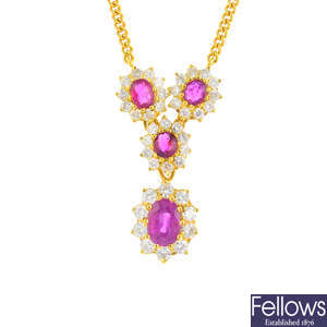 An 18ct gold ruby and diamond floral cluster necklace.