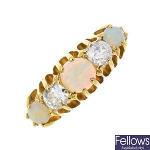 An early 20th century gold opal and diamond five-stone ring.