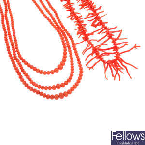 Two coral necklaces.