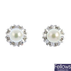 A pair of 18ct gold cultured pearl and diamond cluster earrings.