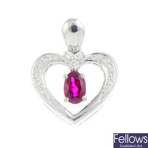 A ruby and diamond pendant.