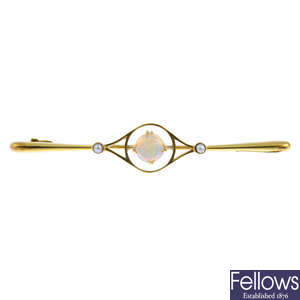 An early 20th century 15ct gold opal and split pearl bar brooch.