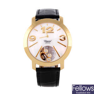 CHOPARD - a lady's 18ct yellow gold Happy Diamonds wrist watch.