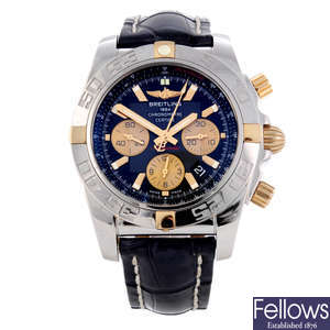 BREITLING - a gentleman's stainless steel Chronomat 44 chronograph wrist watch.