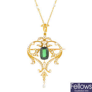 An Edwardian 15ct gold tourmaline and split pearl pendant, with 10ct seed pearl chain.