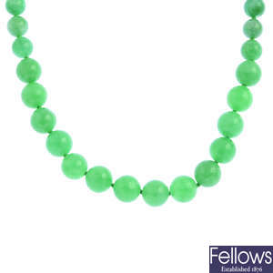 A jade single-strand bead necklace.
