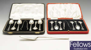 A modern silver marrow scoop & two cased sets of six silver coffee spoons and a pair of sugar tongs.