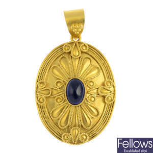A 22ct gold sapphire pendant.