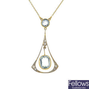 An early 20th century gold aquamarine and diamond pendant, with chain.
