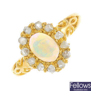 An 18ct gold opal and diamond dress ring.