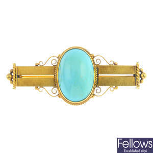 An early 20th century 18ct gold reconstituted turquoise bar brooch.