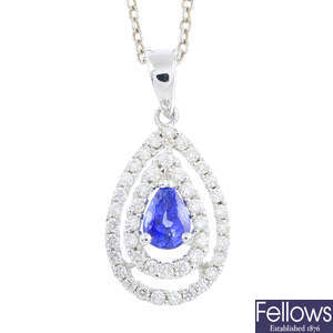 A sapphire and diamond cluster pendant, with chain.