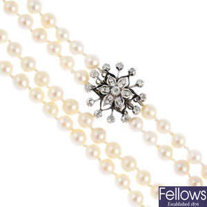 A cultured pearl two-row choker necklace, with late Victorian diamond floral clasp.