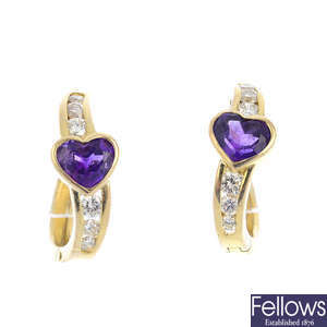 A pair of 14ct amethyst and diamond hoop earrings.